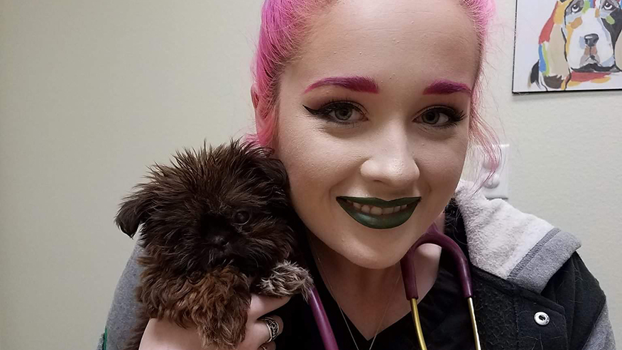 Veterinary Support Staff With Puppy