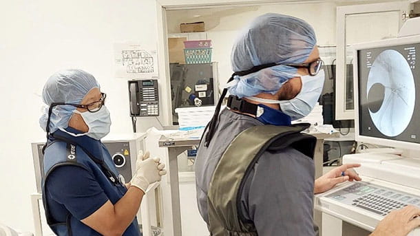 Internal medicine specialists looking at scans